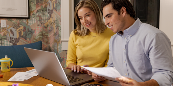 Husband and wife researching college plans